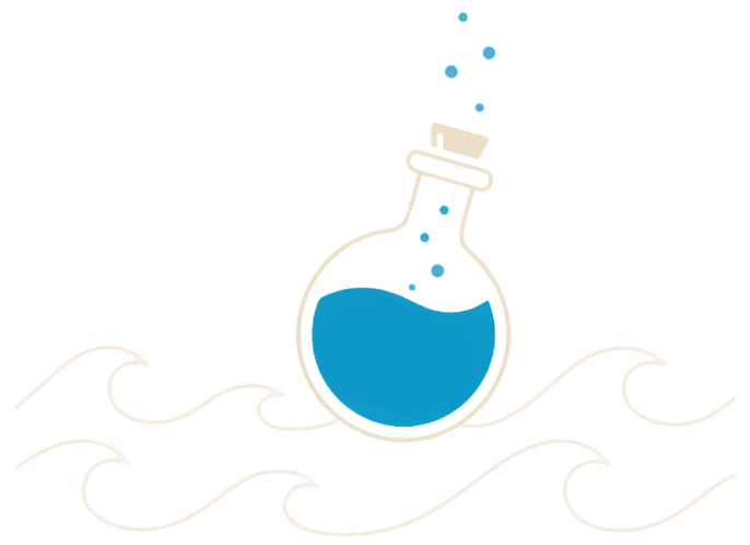 A bottle containing blue liquid floats on the surface of the ocean