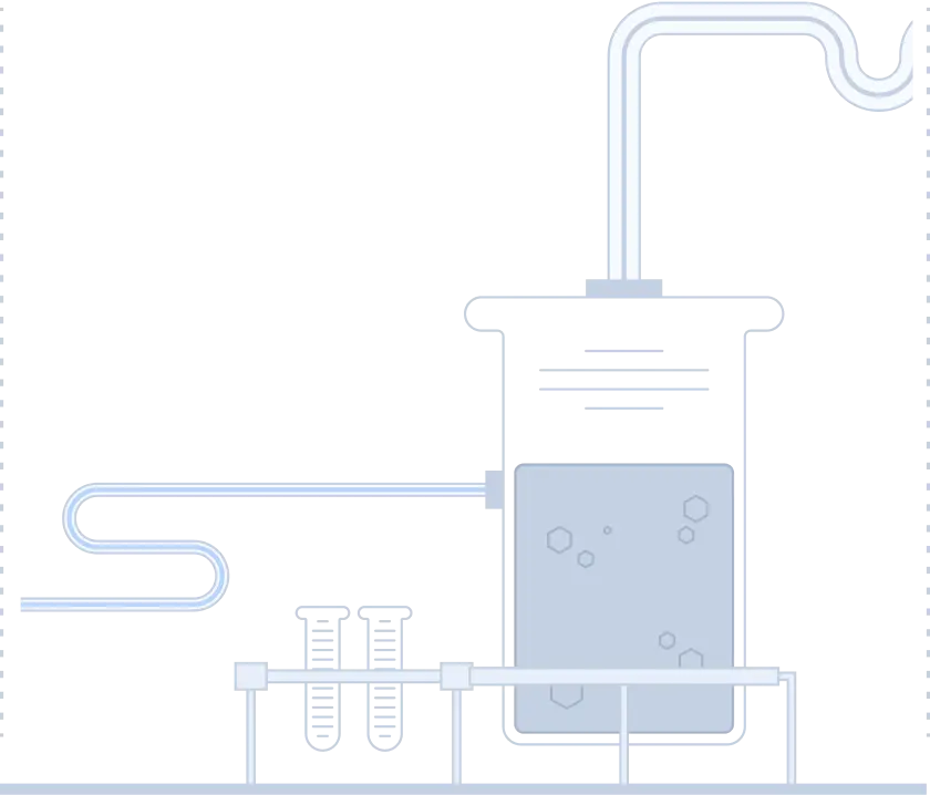 A laboratory with a beaker containing a liquid.