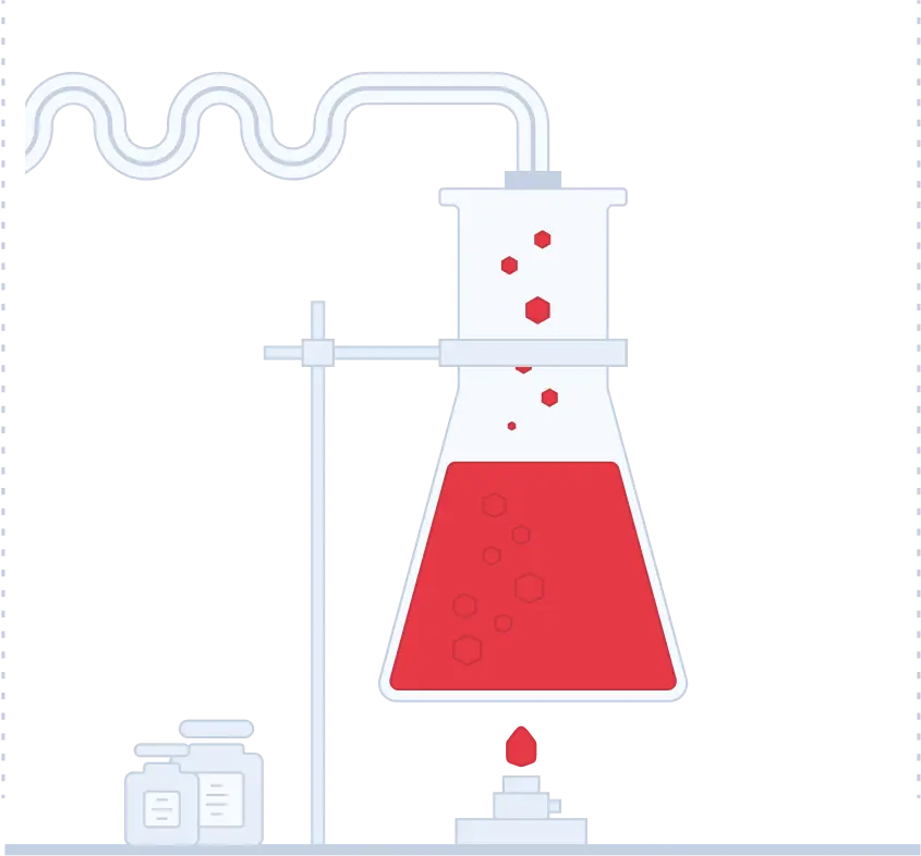 A laboratory with a beaker containing a liquid.